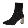 Moda otoño e invierno nuevo estilo europeo y americano tacón grueso simple tacón alto punta fina sexy discoteca adelgazante botas de tobillo de punto para mujer