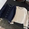 Cárdigan de punto trenzado con puntos de colores estilo coreano para mujer, nuevo modelo otoño e invierno 2026, abrigo suéter suave suelto de cuello redondo con bloques de color