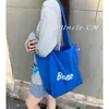 Bolsa de Lona Casual de Gran Capacidad Estilo Coreano para Mujer, Bolsa Tote Versátil con Cierre de Cordón y Diseño de Letras, Bolso de Hombro Portátil Elegante para el Día a Día