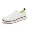 Zapatos para hombre de talla extragrande transfronterizos tendencia de moda tejido volador slip-on zapatos perezosos de un paso zapatos casuales deportivos hombres