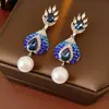 Pendientes Vintage de Perla en Forma de Lágrima con Tachuelas de Diamante, Pendientes de Botón Retro Exquisitos Versátiles con un Diseño Único para Mujer