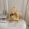 Bolso Cubo con Patrón de Lichi para Verduras para Mujer 2026 Modelo Nuevo Bolso de Hombro Retro de Gama Alta de Nicho Bolso Cruzado Versátil