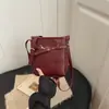 Otoño 2026 Nuevo Retro Alta Calidad Textura Moda Simple Elegante Versátil Hombro Cruzado Portátil Pequeño Cuadrado Bolso