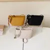 Bolsos de diseñador de nicho súper populares transfronterizos para mujer 2026 nuevos bolsos cruzados versátiles de moda, bolsos de mano pequeños, bolsos tipo cubo