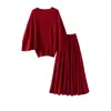 Conjunto de saia e blusa de tricô estiloso e delicado para mulheres, novo conjunto de duas peças outono e inverno simples de alta qualidade com blusa de manga morcego
