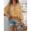 2025 Primavera y Verano Nuevos Tops y Camisas Estilo Bohemio de Resort Estampados con Cuello en V y Cordones de Manga Larga para Mujer
