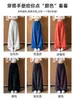 Calça de moletom roxa estilo americano com barra curva para mulheres, novo modelo de outono de 2026, casual e relaxada, corte solto, afina a silhueta, calça esportiva de perna larga