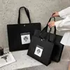 Nueva tienda de ropa, bolso de mano no tejido, bolsa de embalaje especial para mujer, bolsa de regalo, bolsa de embalaje de compras, venta al por mayor