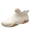 Botas de lluvia de moda para pareja transfronterizas Zapatos impermeables para exteriores de estilo coreano para mujer Zapatos de goma antideslizantes para cocina suela blanda cómodos Zapatos para lavado de autos mujer