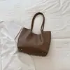 Bolsa feminina simples estilo coreano Shuai Mijia 2026 nova moda bolsa de balde casual para o dia a dia bolsa de ombro único texturizada para mãe e filha