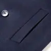 Casaco masculino de lã estilo britânico, acima do joelho, de abotoamento duplo, com gola de terno, disponível em várias cores para outono e inverno, com um design longo e fluido.