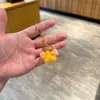 Chaveiro de acrílico transparente com areia movediça de desenho animado, pingente de bolsa, pequeno presente para crianças, decoração de carro