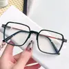 Gafas de metal de color té, ultraligeras, modernas y geniales, para mujer, con montura transparente, alto atractivo estético, montura grande, efecto adelgazante, lentes neutros