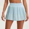 Falda plisada deportiva 2026 con doble capa y bolsillos, anti-exposición, adecuada para tenis, correr, fitness, diseño dos en uno, aeróbicos, minifalda de yoga