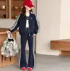 Conjunto Deportivo de Primavera y Otoño para Niñas 2026 Nuevo Moderno Chaqueta Corta y Pantalones de Campana Conjunto de Dos Piezas para Niños y Niñas Mayores