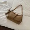 Bolsa feminina simples e elegante de camurça para o outono de 2026, grande capacidade, versátil para usar no ombro, na mão, na transversal e sob o braço para o trabalho