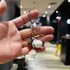 Llavero de cachorro lindo de dibujos animados, muñeco de plástico blando tridimensional, accesorio para mochila, llavero de coche, regalo pequeño, venta al por mayor