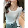 Suéter de punto, nueva ropa de otoño e invierno para mujer 2026, suéter ajustado de cuello redondo, top popular de manga larga con cuello bajo