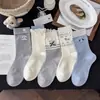 Meias Fofas Novas de Cachorrinho para Mulheres, Meias de Cano Médio, Meias de Algodão para Primavera e Outono, Meias Longas Modernas para Meninas com Renda de Laço de Desenho Animado