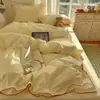 Modelo Nuevo 2026 Algodón 100% Algodón Lavado 40S con Puntada de Borde Denso Color Sólido Juego de Cuatro Piezas - Serie Borde de Nube Estilo Sábana de Cama 1.2m Tres