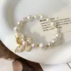 Pulsera de Perlas Shijia Mariposa Estilo Francés Lujo Ligero Elegante Versátil Diseño de Nicho Joyería Personalizada