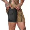 Venda direta da fábrica shorts esportivos de marca moderna de camada dupla, transpiráveis e de secagem rápida para homens, shorts esportivos de verão de comprimento 3/4 de secagem rápida para fitness