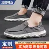 Fabricante Zapatos de Lona para Hombre Primavera Otoño Zapatos Casuales Versátiles sin Cordones Suela Suave Transpirables Zapatos para Hombre Venta al por Mayor