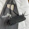 Bolsa de ombro fofa ins de moda transfronteiriça 2026 primavera nova bolsa simples para o dia a dia de alta aparência na moda bolsa de ombro única