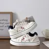 Zapatillas estilo campus de nicho de Belle 2026 otoño nuevas zapatillas de moda ins versátiles casuales zapatos blancos B3803