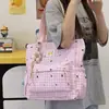 Bolsa de ombro e bolsa transversal de grande capacidade para alunos do ensino fundamental e médio, adequada para carregar livros para a aula, aulas de reforço e uso diário.; um design elegante e simples