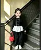 Top de dos piezas con volantes para niña con dobladillo de encaje cruzado, camiseta básica de manga larga estilo coreano para otoño de 2026