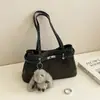 Bolso de axila retro para el commute de mujer 2026 Nuevo Otoño Nicho Súper Popular Exquisito Estampado de Leopardo Gamuza Bolso de un solo hombro