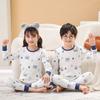 Outono e inverno de 2023 roupas de casa infantis traje de roupa íntima básica infantil de desenho animado suéter de algodão gola redonda pijamas para meninos e meninas
