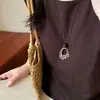 Collar de borlas acrílicas transfronterizo europeo y americano, sensación de lujo ligero y alta gama, cadena para la clavícula con diseño Maillard, joyería de nicho para mujeres
