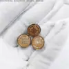 Suministro de Broches Personalizados de 1 cm 1.2 cm con Botones Rápidos y Cubierta de Pintura de Puntos con Forma de Flor a la Moda Proceso de Pegamento