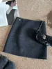 Falda midi de lana de color liso de alta gama para mujer 2026 Otoño/Invierno Nuevo Estilo Coreano Simple Versátil de línea A que se ajusta a la cadera