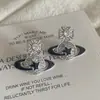 Brincos de Tarraxa Estrela de Cinco Pontas Saturno com Esmalte de Imperatriz e Zircônia Microincrustada com Gota de Óleo, Brincos Versáteis de Moda de Luxo Leve
