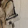 Bolsa baguette listrada com poá retrô para mulheres, novo estilo 2026, com fivela de cinto, bolsa de ombro, adequada para trabalho e deslocamento, de mão ou de ombro