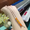 Ventas Directas de Fábrica Suministro en Vivo Collar de Ópalo de Fuego Brillante Invierno Cálido Sol Piedra Principal 6*8mm Plata S925 Incrustación de Precisión