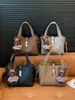 Bolso Cubo Sencillo de Mano Estilo Coreano para Mujer 2026 Nuevo Modelo Invierno Bolso de Hombro Cruzado Minimalista Elegante de Alta Calidad