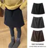 Falda corta de lana estilo coreano para mujer, falda lápiz corta de lana engrosada para otoño e invierno, falda corta de trabajo, falda corta de línea A adelgazante para otoño e invierno