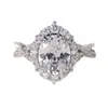 Anel de Noivado Feminino Twist Band com Coroa Dupla Cravejada de Diamantes, Pedra Principal Grande Oval Moissanite, Fonte de Suprimento