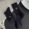 Calcetines de dibujos animados para mujer, calcetines de media pantorrilla bordados de hueso de cachorro estilo japonés, estilo universitario lindo estilo coreano, calcetines holgados de moda, sin costuras