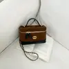 Bolsa de corrente com padrão de losangos para mulheres, novo modelo de outono 2026, super popular para o trabalho, pequena bolsa de mão, bolsa de ombro e transversal tipo balde