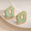 Pendientes geométricos de rombos en color rojo vibrante estilo Hong Kong transfronterizos con ribete dorado, tachuelas huecas de resina de doble capa, accesorios de vestir para mujer