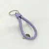Chaveiro Criativo de Corda de Couro Estilo Faixa de Cabeça Trançada para Homens e Mulheres Chaveiro de Carro Cordão Pingente de Bolsa Acessórios Venda por Atacado