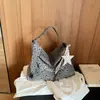 Bolsa feminina estilo casual 2026 nova bolsa tote casual de outono para escola e trabalho bolsa de ombro transversal de grande capacidade