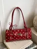 Bolso de Hombro y Axila de Punto de Lunares de Alta Gama Estilo Coreano Transfronterizo para Mujer 2026 Primavera Nuevo Bolso Cilindro Simple de Moda
