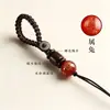 Llavero de cordón hecho a mano con cordón Ocho Guardianes del Zodiaco con cuentas redondas de ágata roja con cuentas cilíndricas de sándalo hebilla de vida tejida con cordón