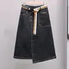 Talla grande verano irregular A- línea falda adelgazante moda cintura elástica falda de mezclilla combinable falda midi moderna para mujer